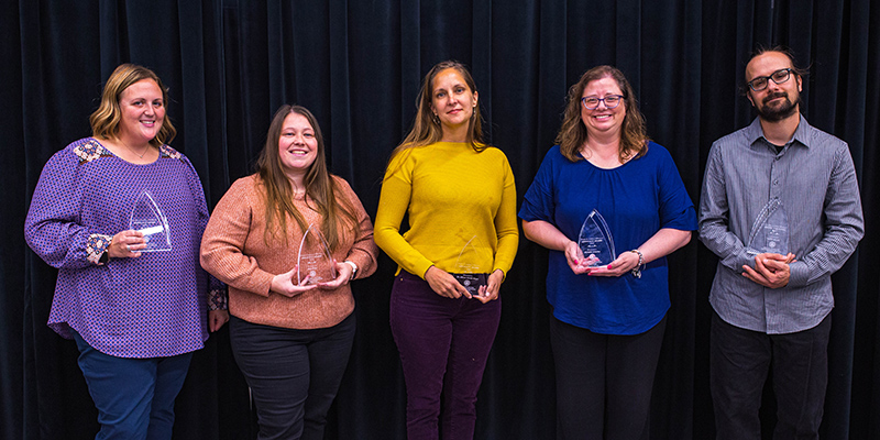 Advocacy award winners with their awards.